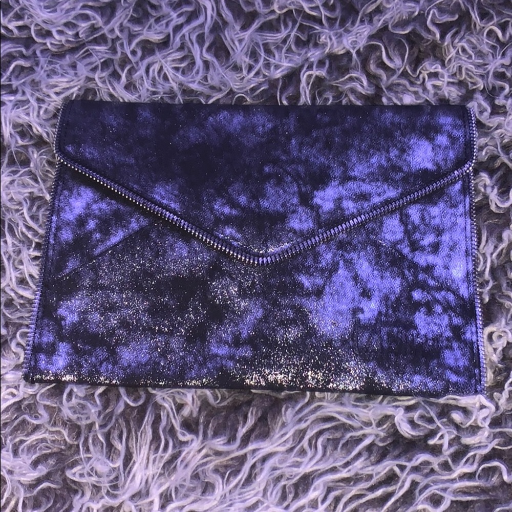 Black and Silver IT cosmetics makeup clutch